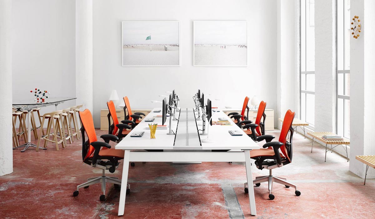 Cool conference table with orange office chairs