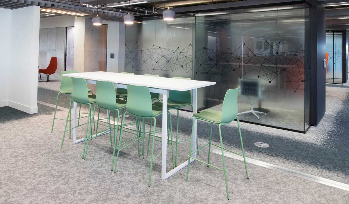 Collaboration space with counter height chairs and counter height table